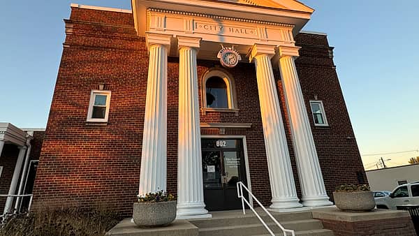 The exterior of Beech Grove City Hall, a low municipal building fronting the street with its entrance at the center
