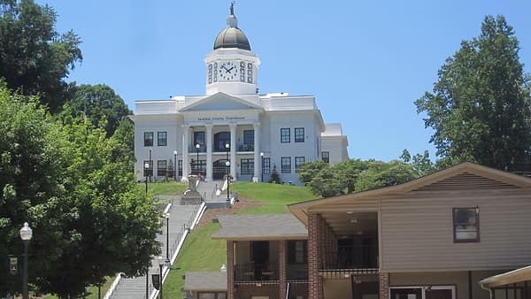 the Jackson County Courthouse and Public Library complex that stands prominently atop a hill at the end of Main Street in my