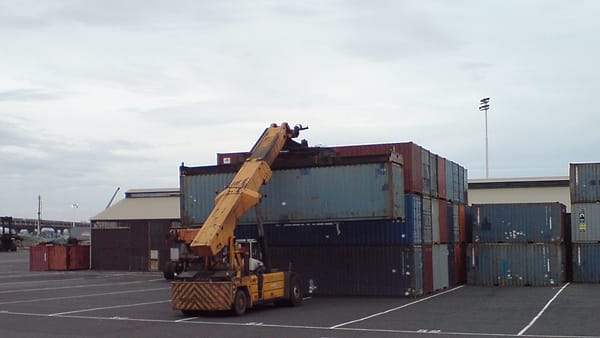 Stacking containers in Port of Onehunga in Auckland , New Zealand