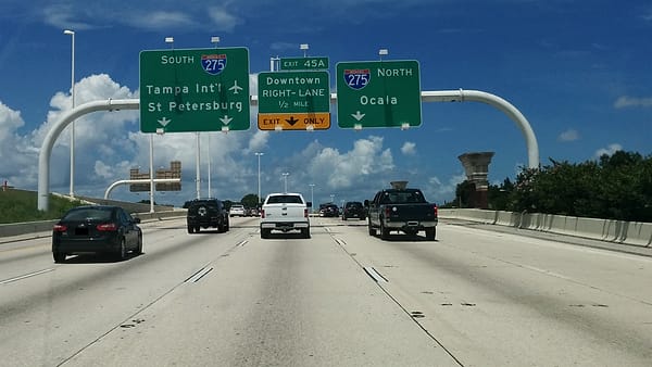 Westbound Interstate 4 approaching the interchange with Interstate 275, where the carriageway divides