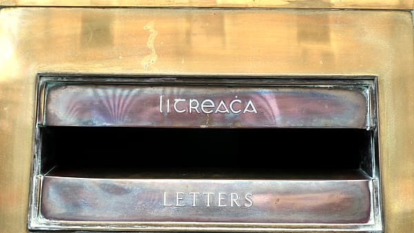 Bilingual Irish-English letter-box at Cork General Post Office , in which litreacha means letters in Irish