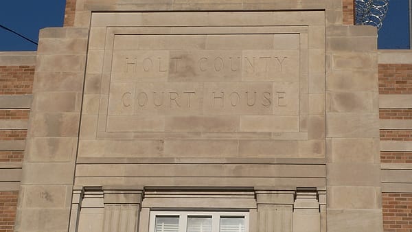 Inscription on west (front) facade of Holt County Courthouse in ONeill, Nebraska