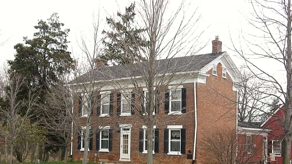 Front and southeastern side of the Lenhart Farmhouse , located at 6929 Piqua Road northeast of Decatur in Root Township , Adams
