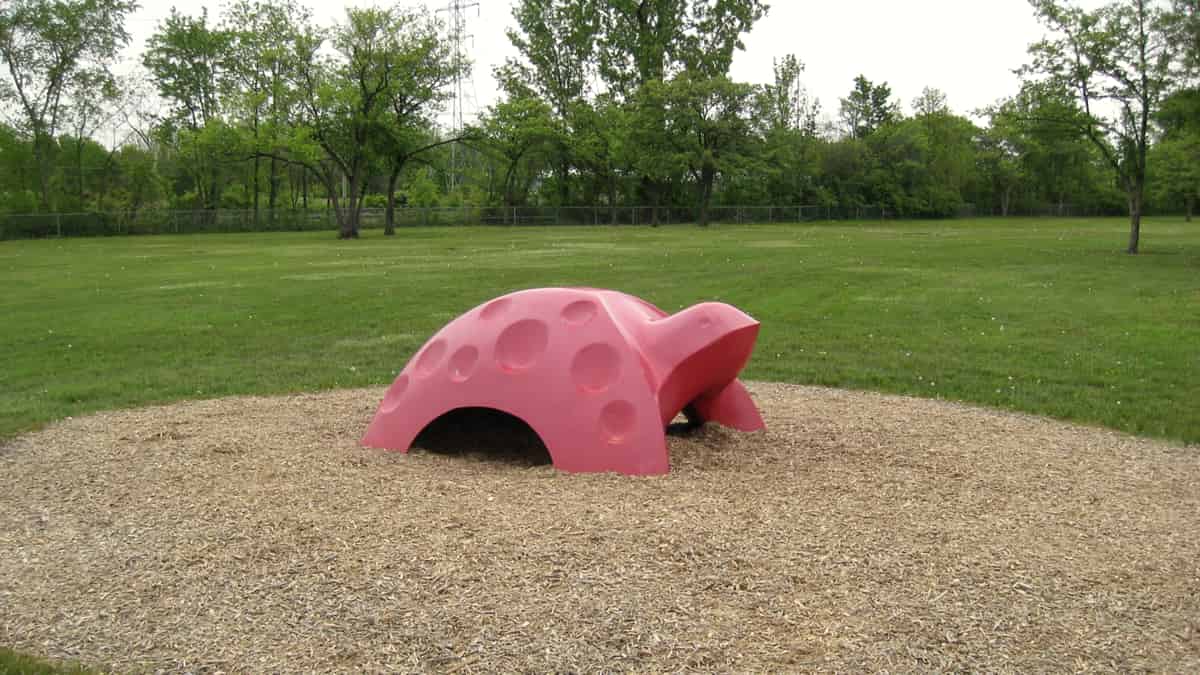 The playground at Indian Village Elementary School, with climbing equipment standing on open ground